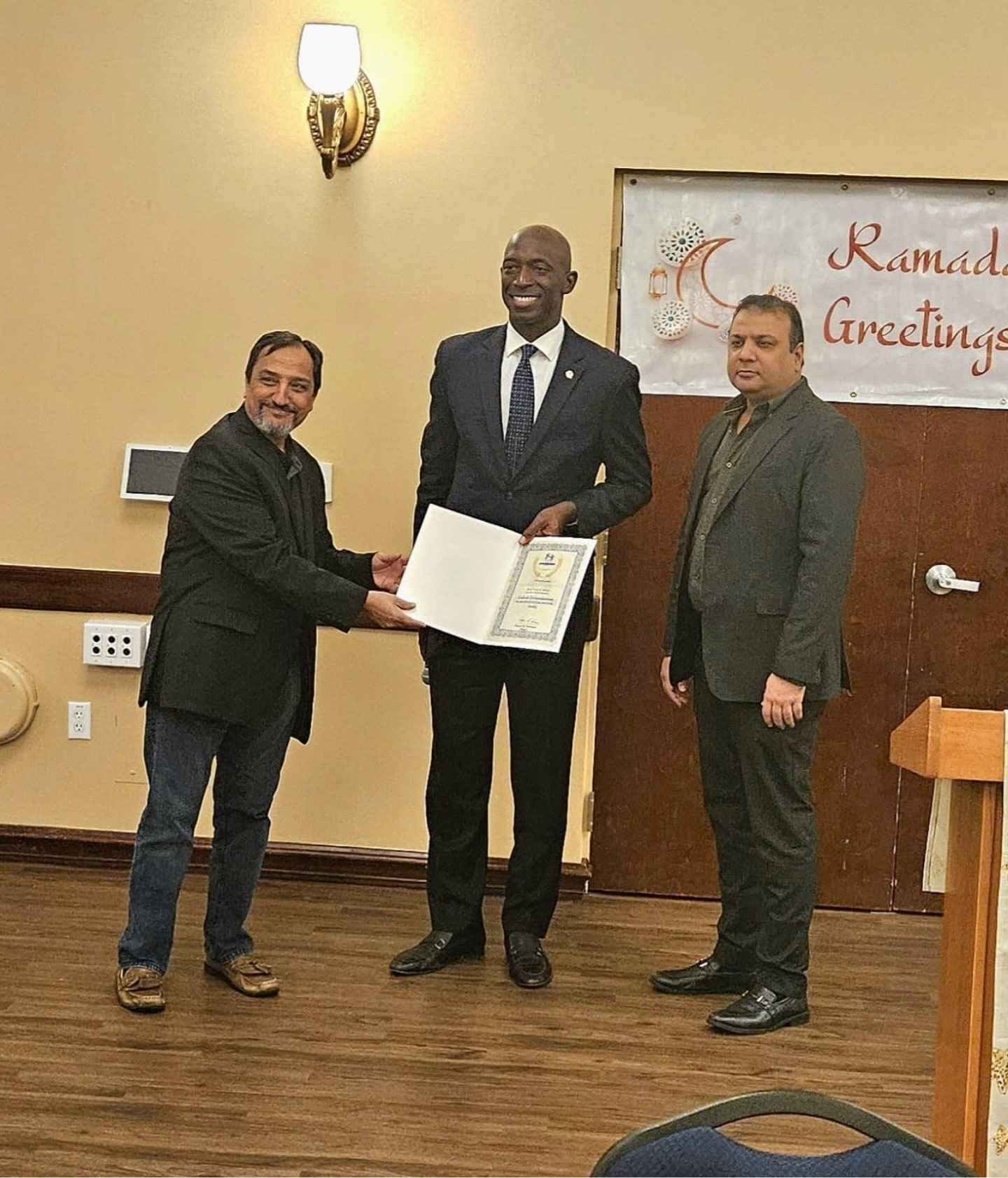 Our team members were honored with a Certificate of Recognition from the City of Miramar, FL for their outstanding community service at our Ramadan Iftar. / فريقنا في ميرامار، فلوريدا كُرّم بشهادة تقدير لخدمتهم المجتمعية المتميزة.