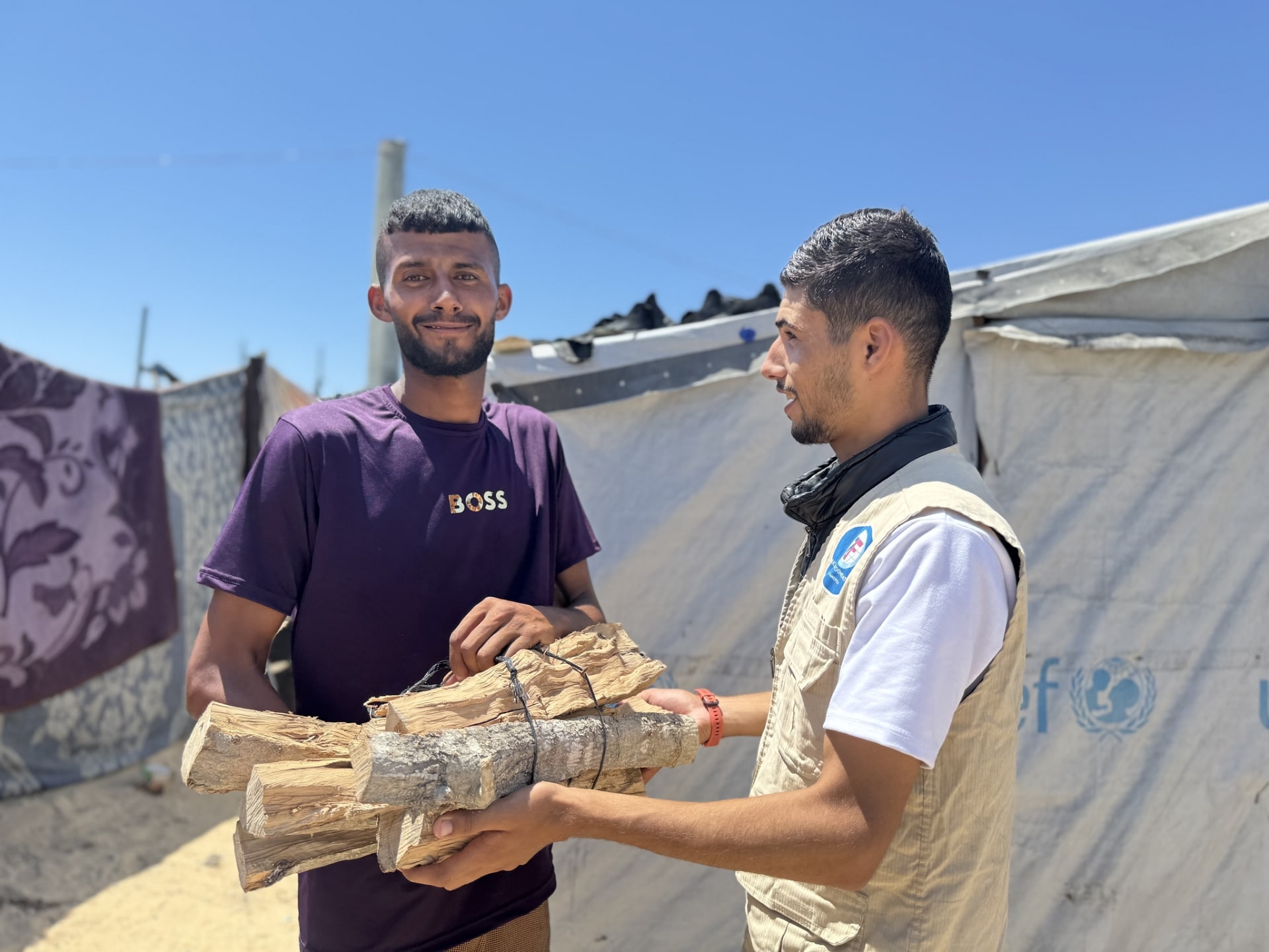 Firewood distribution in Gaza assists with cooking and keeping warm.
