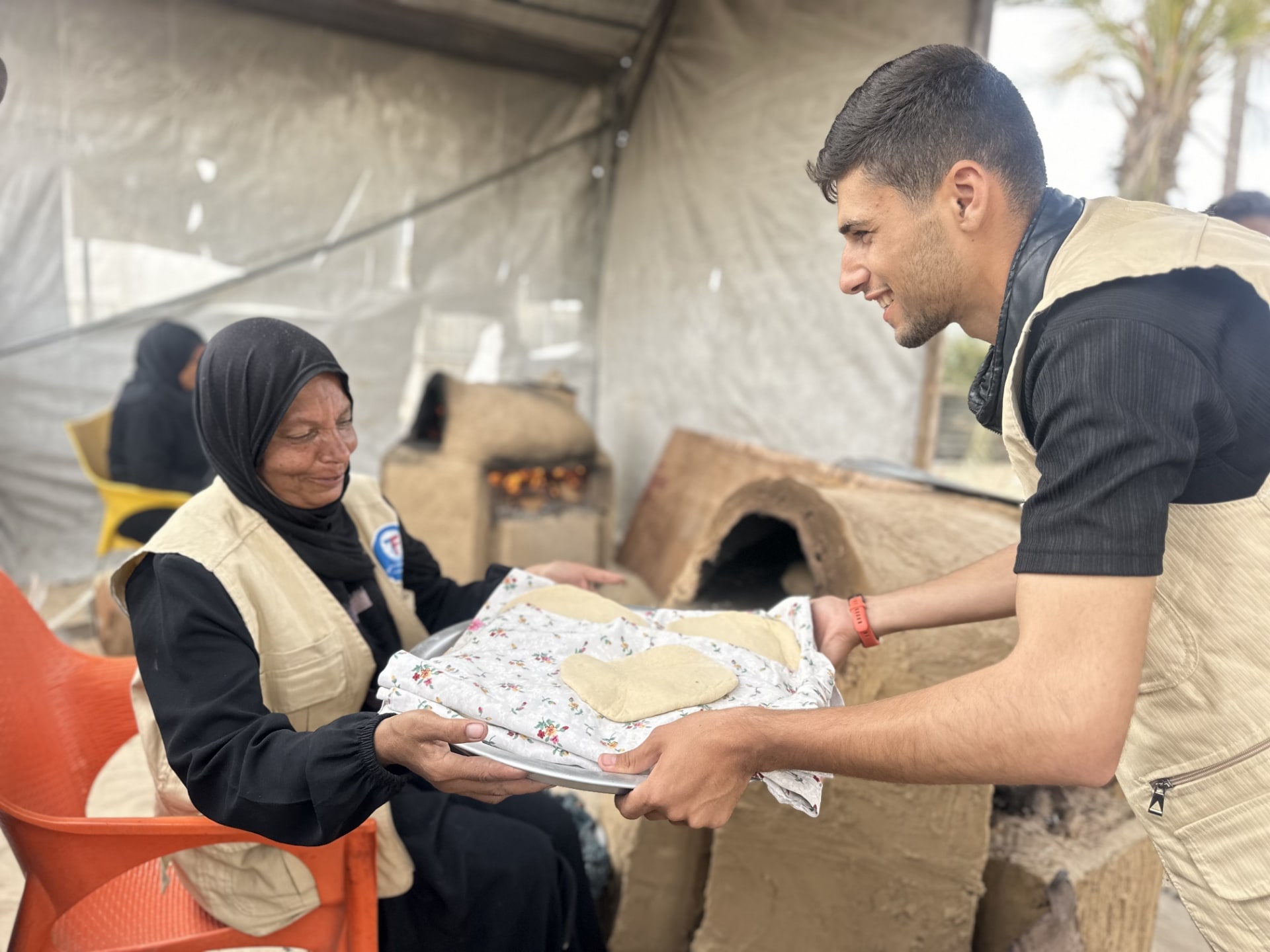 Fresh bread stations for families in Gaza.