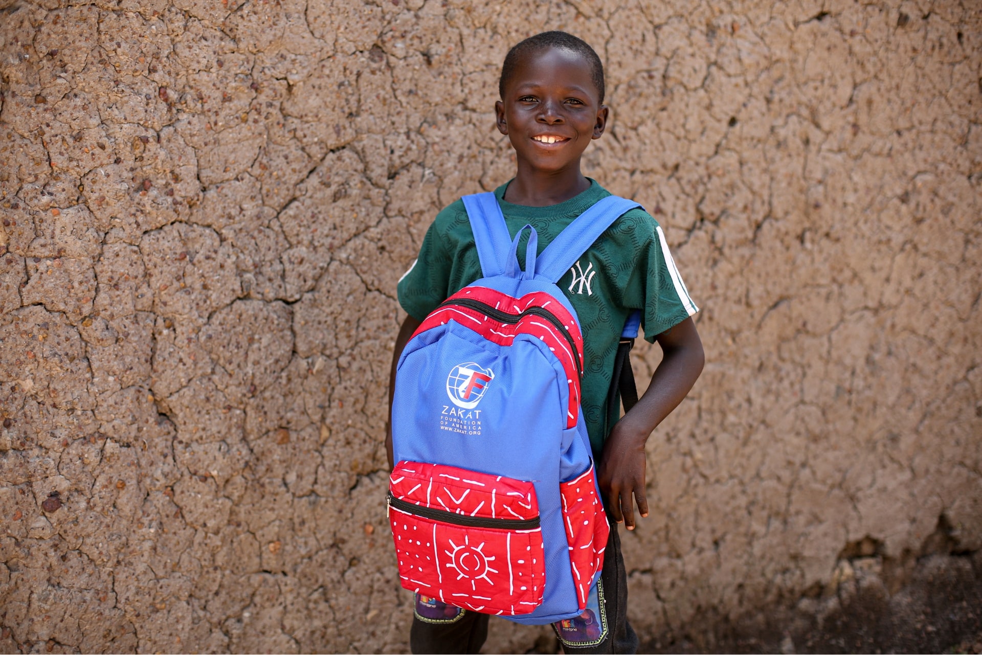 Orphan sponsorships will open doors to opportunities for this boy in Mali as he heads off to school.