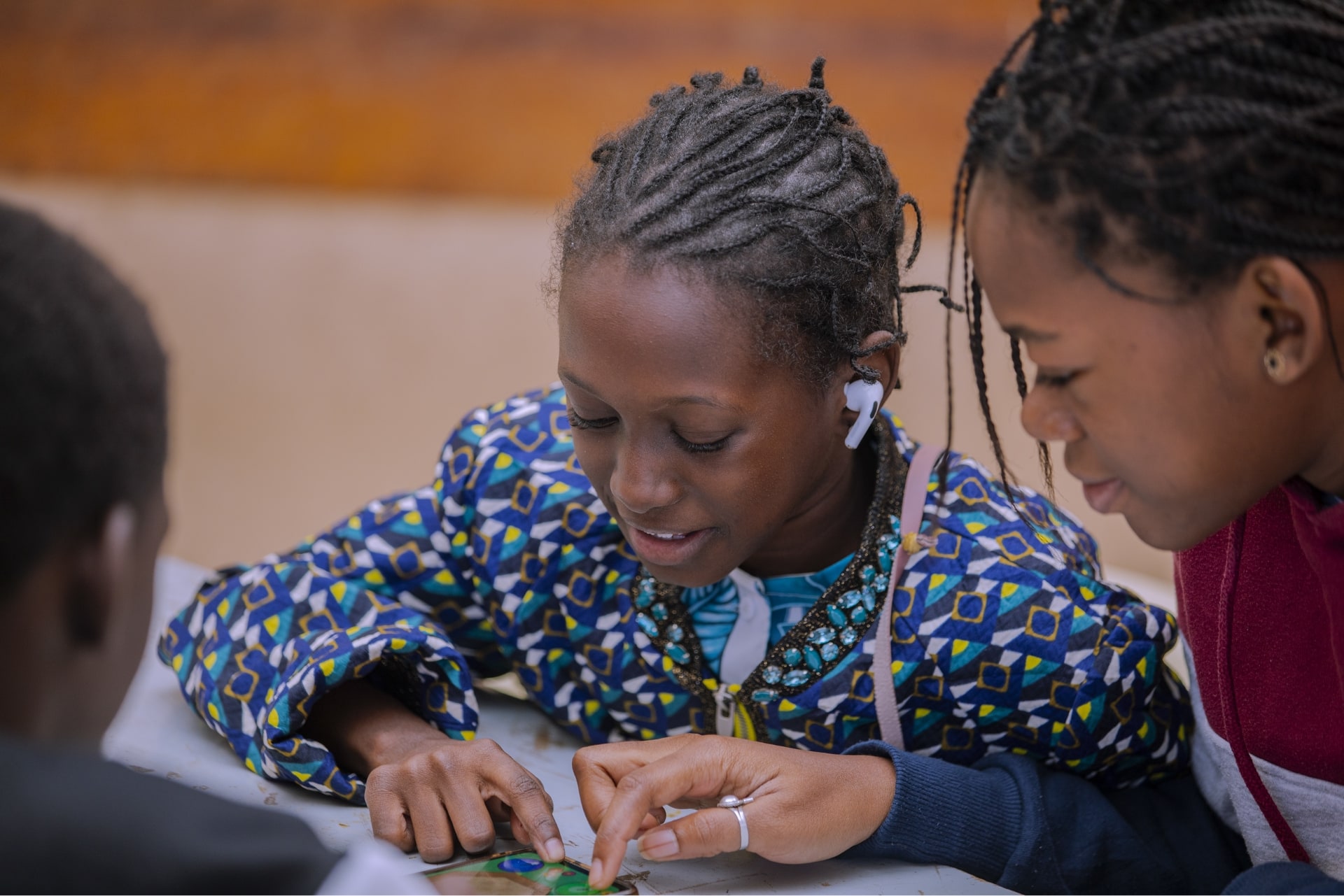 Senegalese sponsored orphans take time to play a game together.