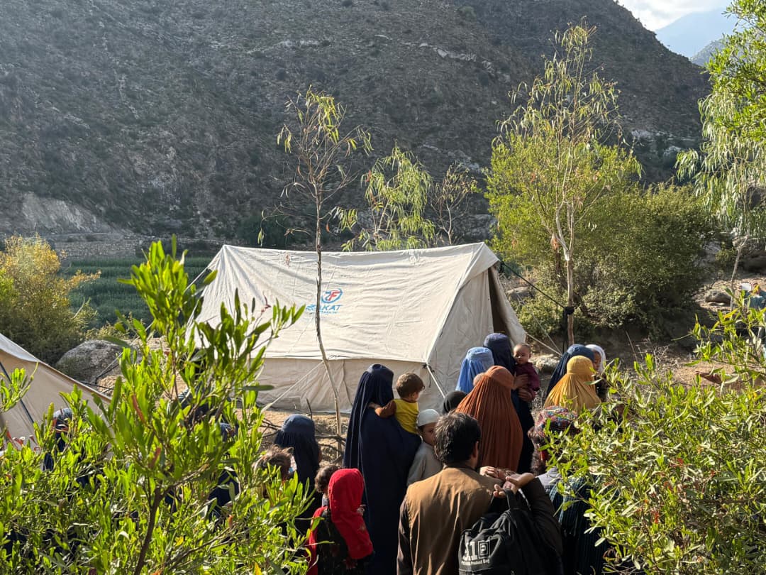 Families make their way to our shelter tents following the Afghanistan earthquake.