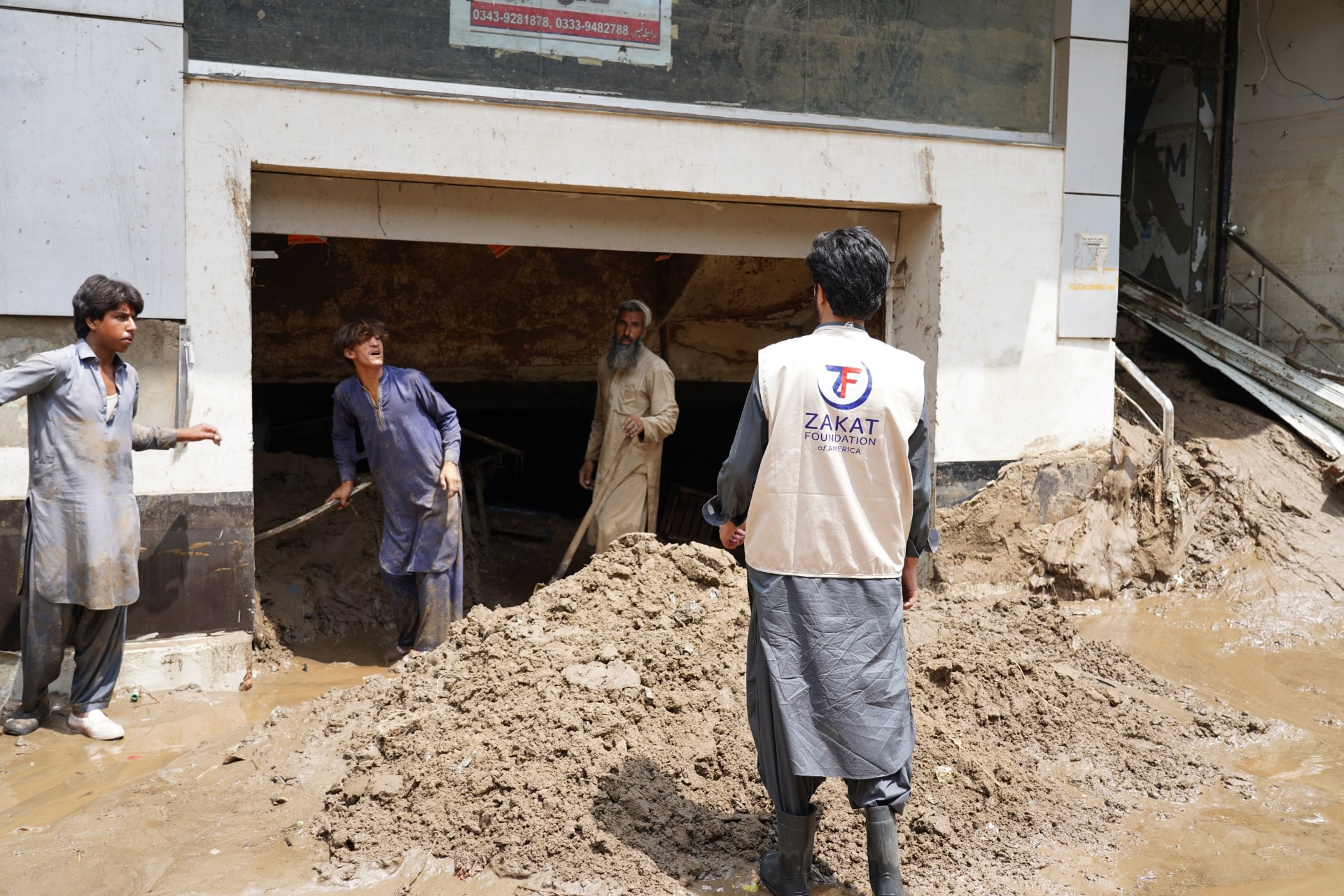 Pakistan flood affected families share their struggles with our team as we provide support.