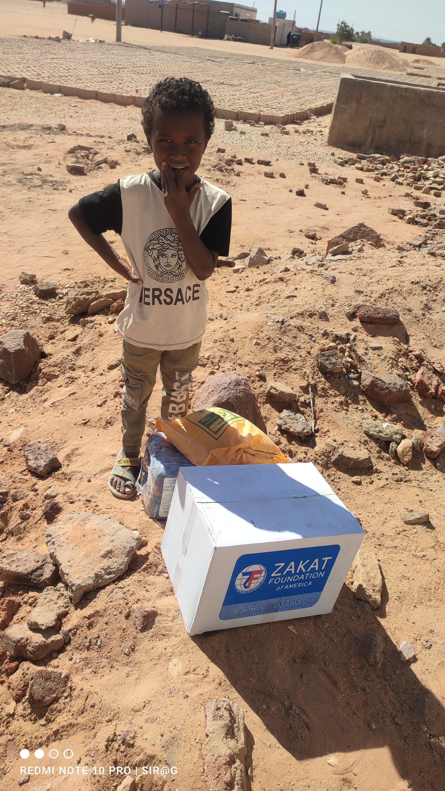 A young Sudanese boy receives critical hygiene products to ensure his health
