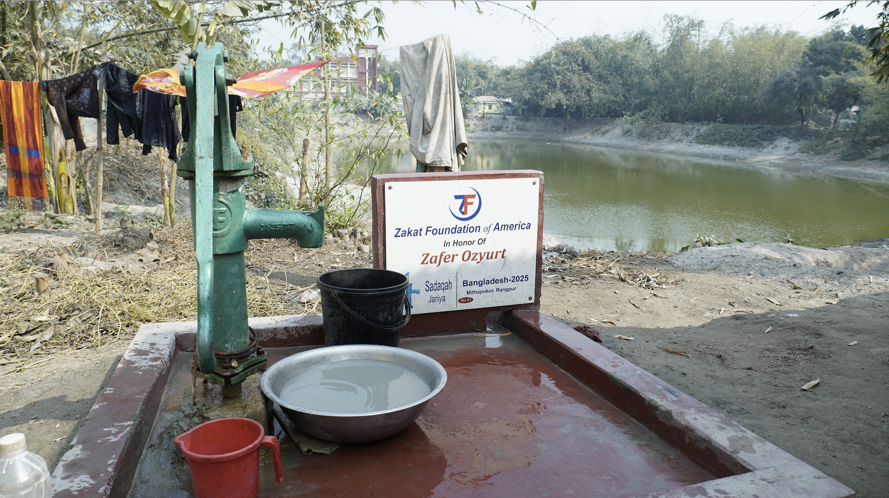 A newly installed handpump in Bangladesh brings relief from contaminated water sources