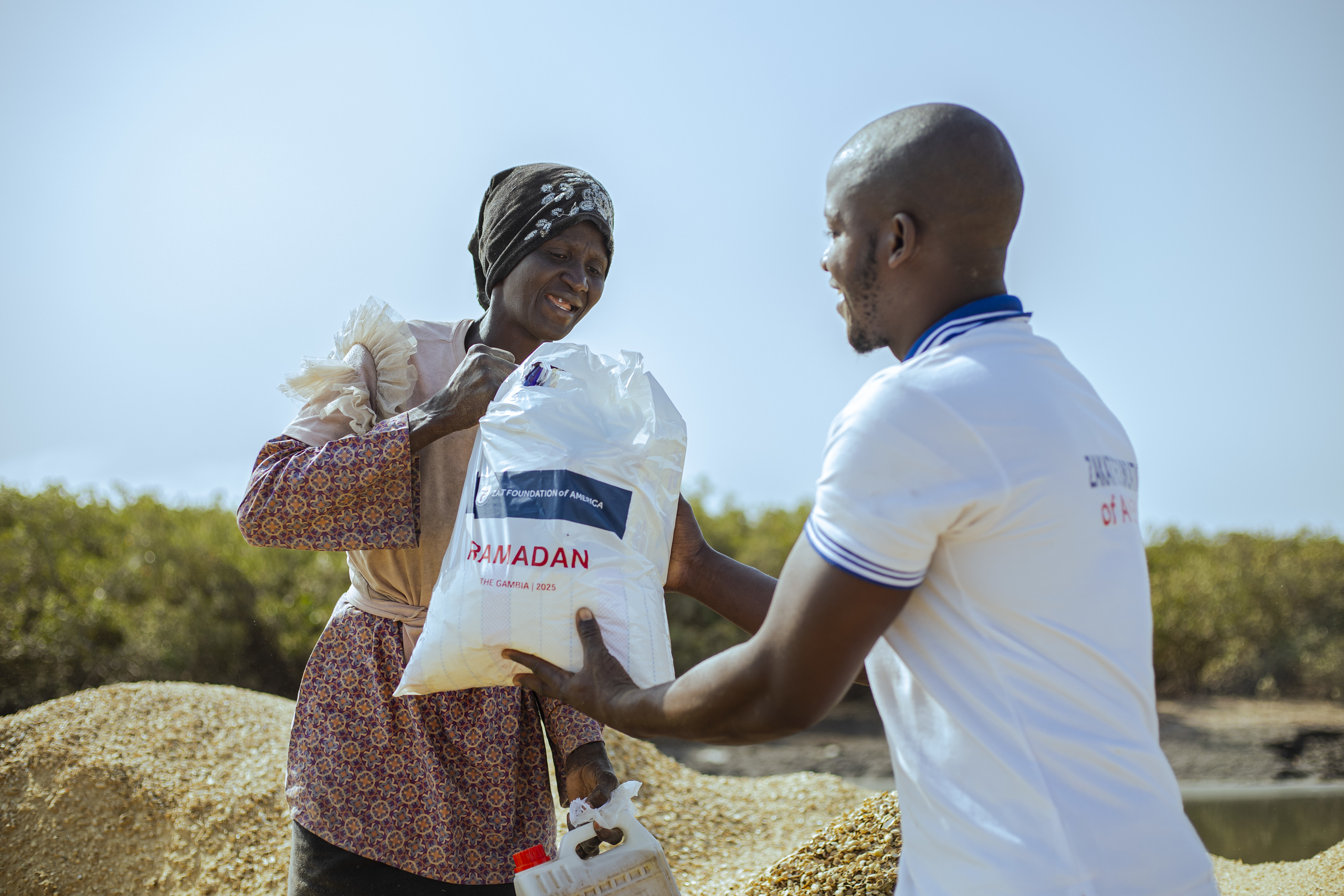 A smile of relief when receiving a food package brings hope and healing