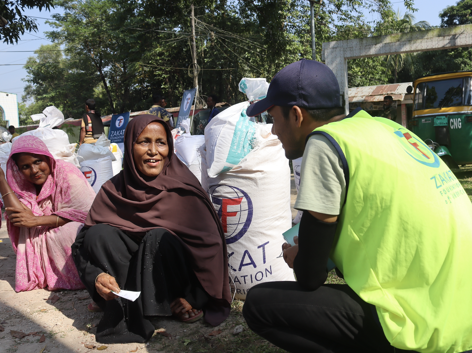 A tender interaction with our field team and a rice recipient brings hope to the needy