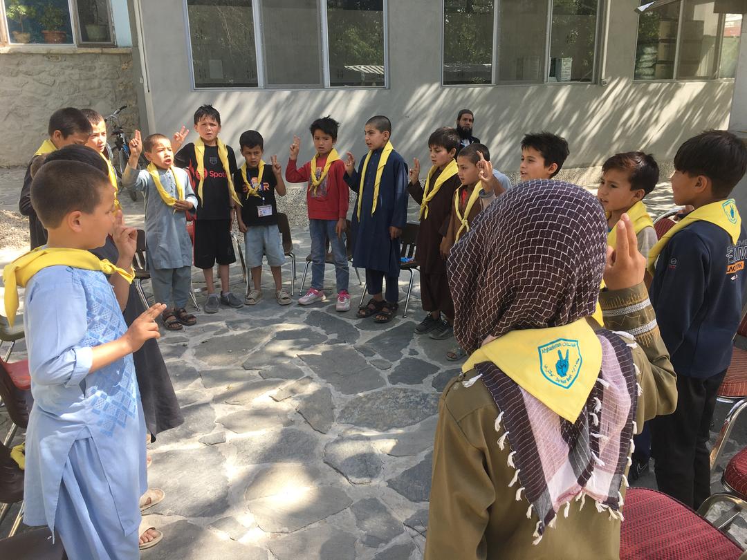 Afghan Scouts say their pledge as they begin a day of learning with your support