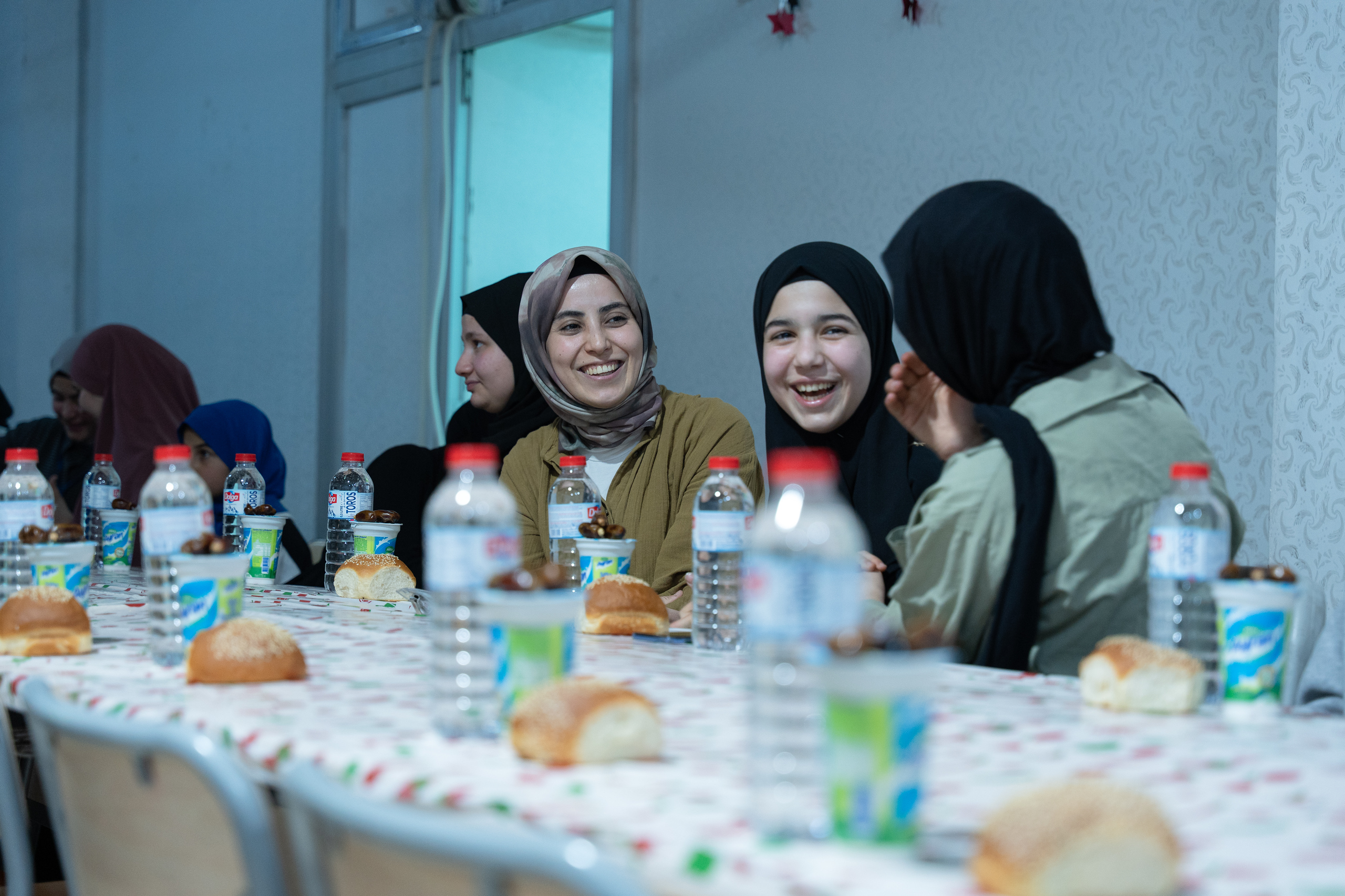 As families await iftar meals they spend time in gratitude and happiness