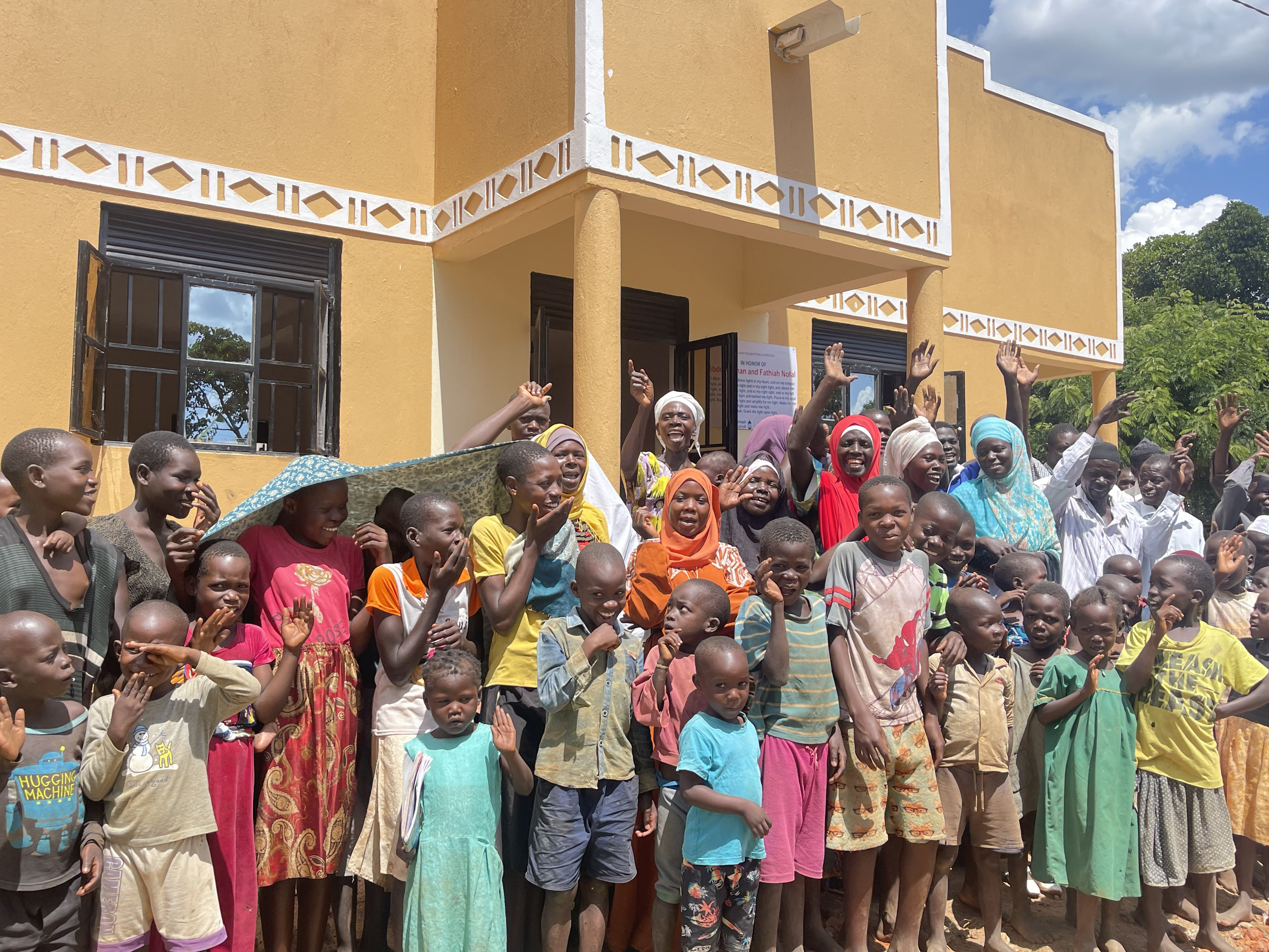 Congregants in Uganda's newly build Masjid An Nur share they joy