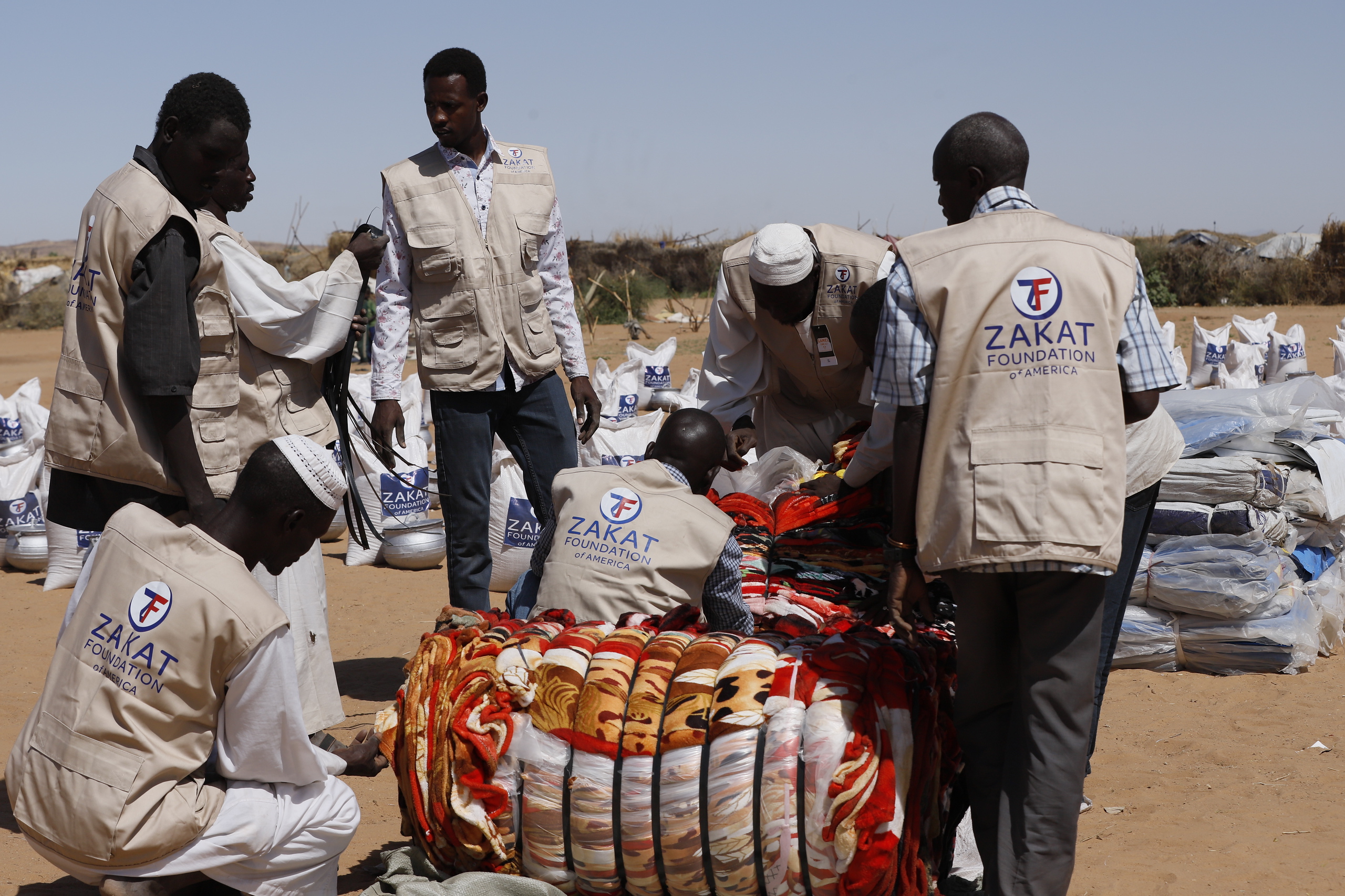 Emergency relief staples are prepared for displaced families in Sudan