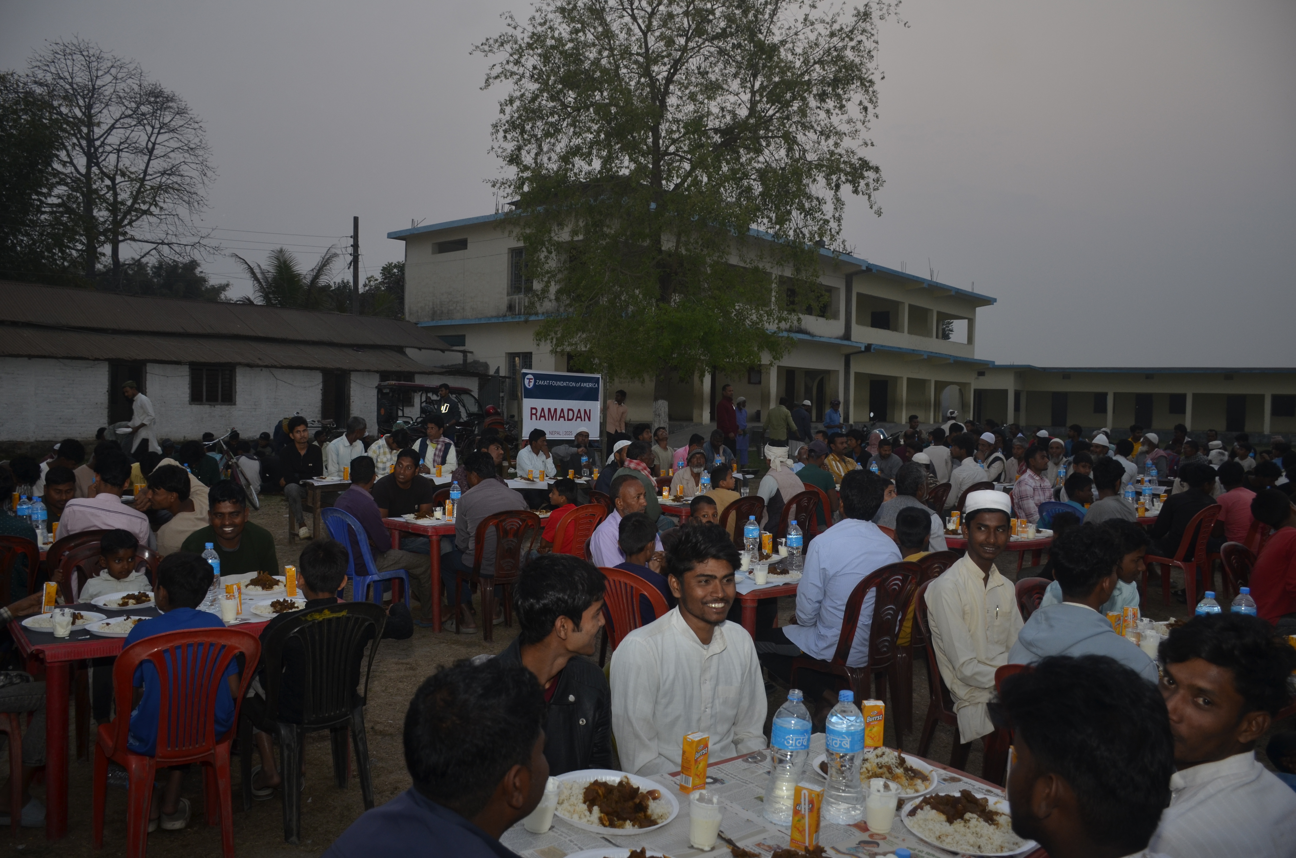 Families are served hot iftar meals in Nepal