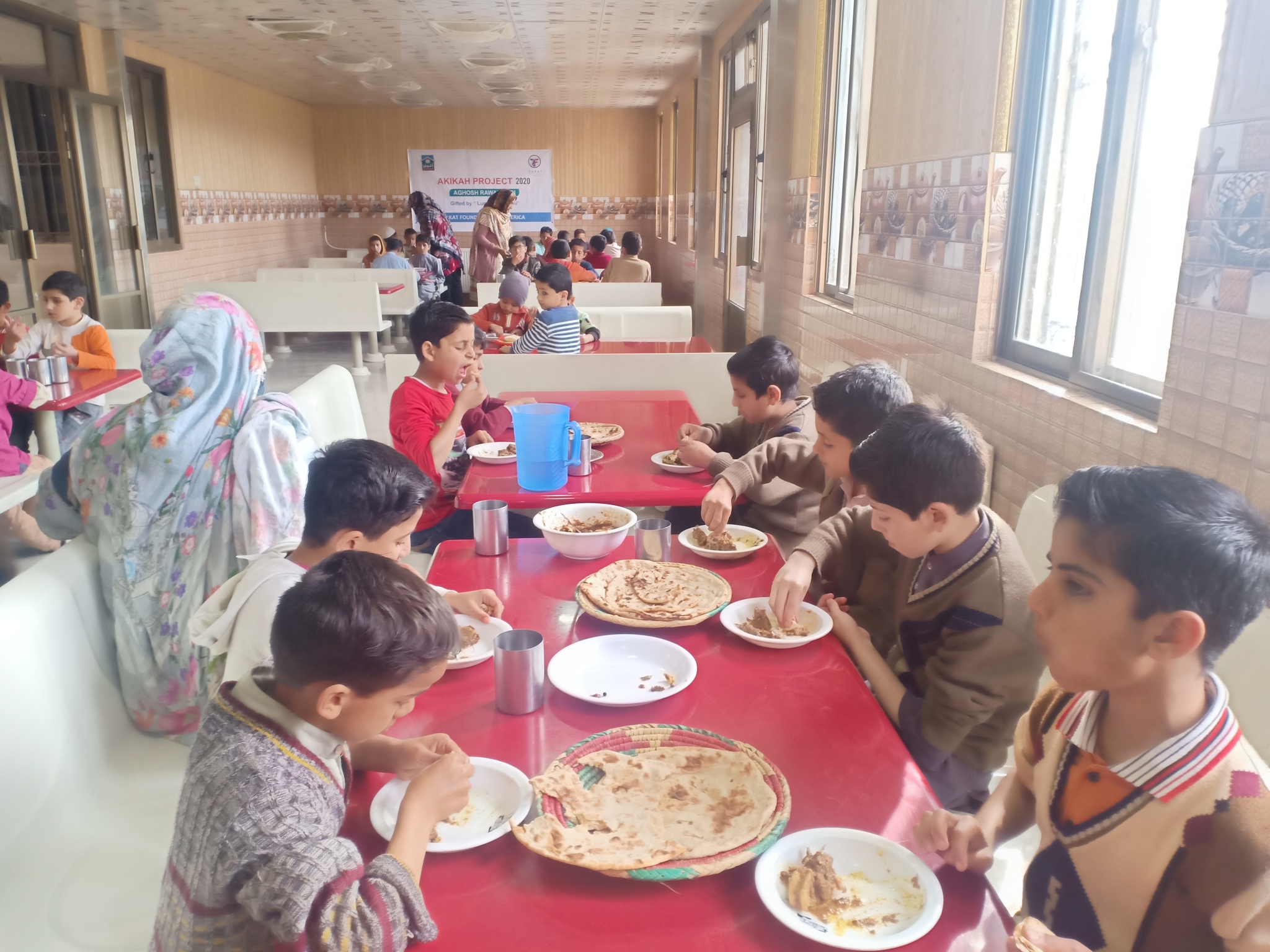 Families enjoy the blessings of aqiqah meat