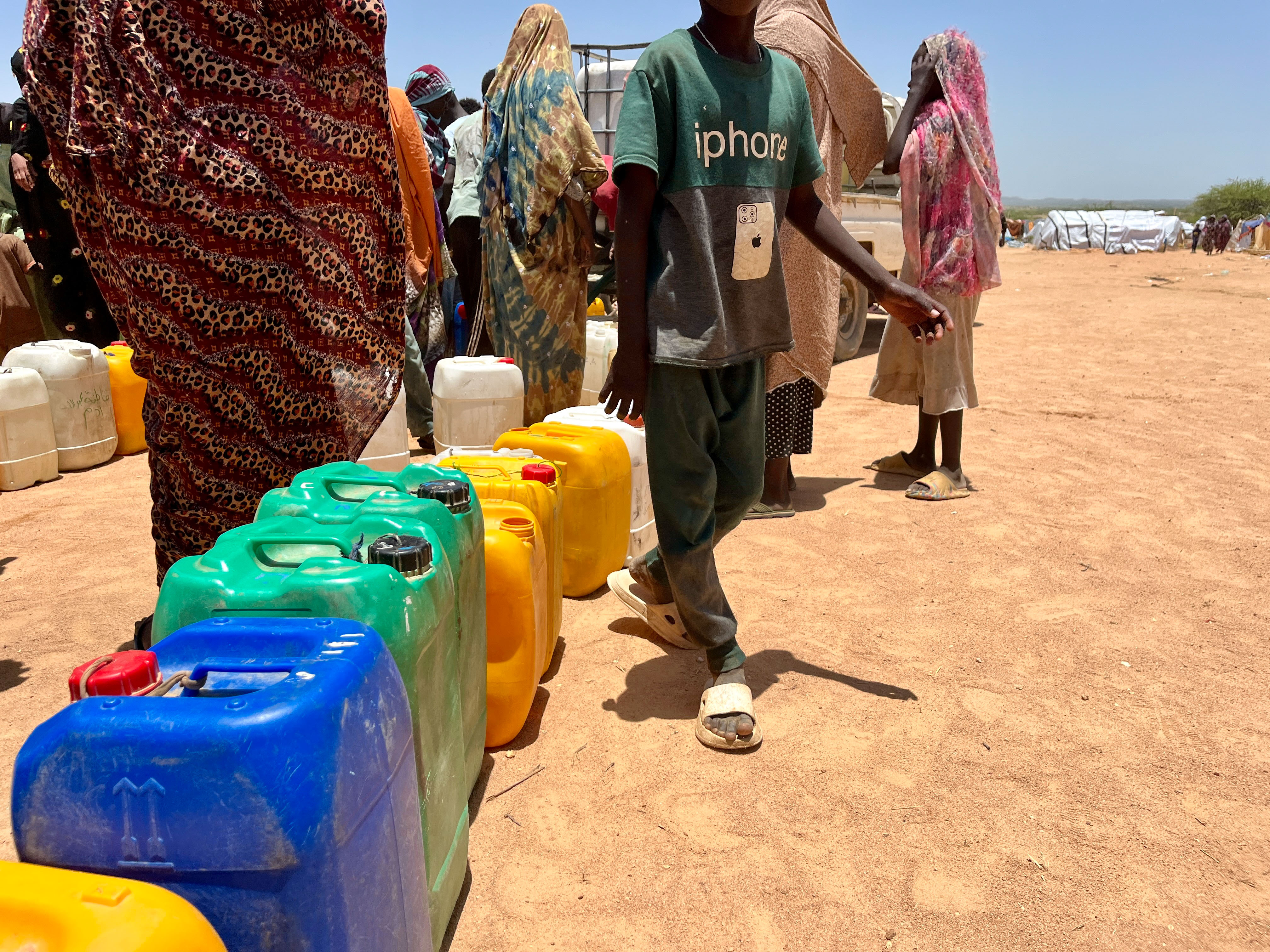 Families in Sudan line up to secure clean drinking water