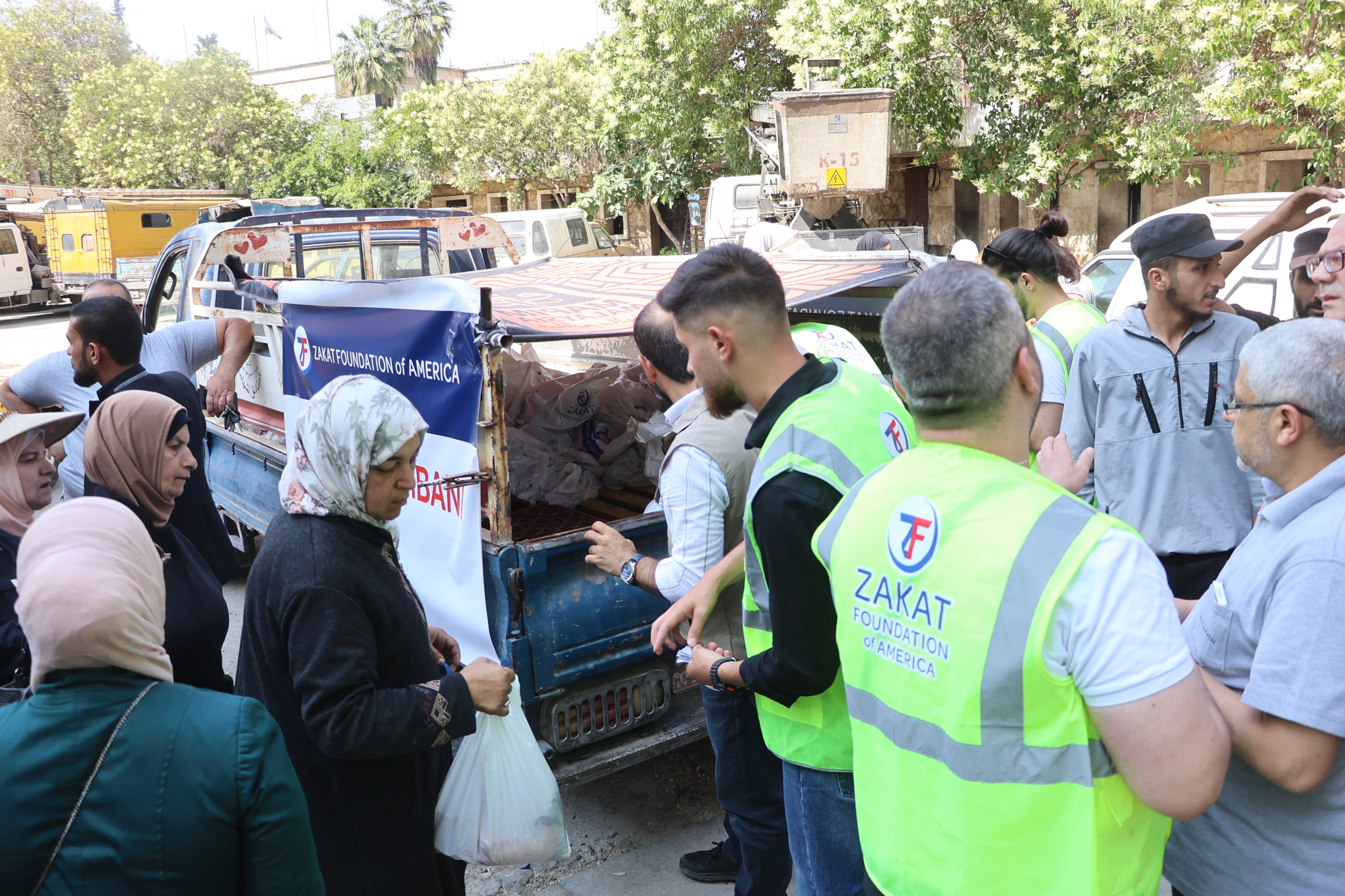 Families line up for nourishing Udhiyah-Qurbani meat