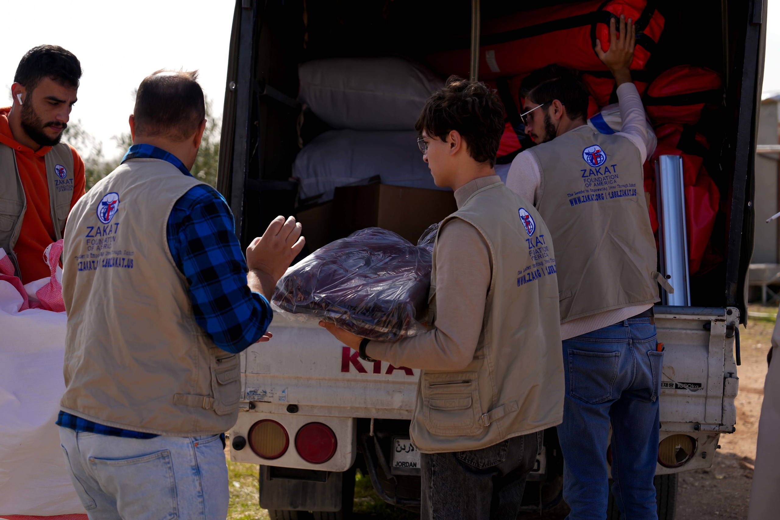 Field teams in Jordan unlock winter items for distribution to needy families