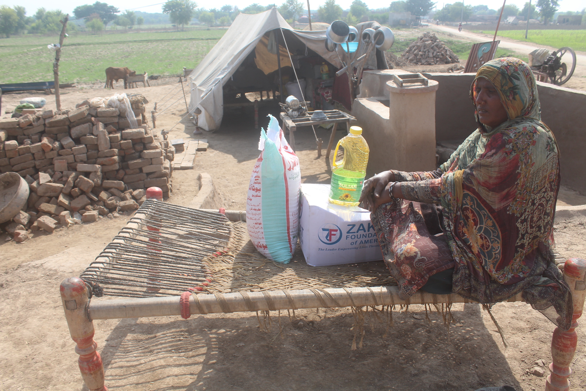 Flood displaced families receive emergency food packages for nourishment