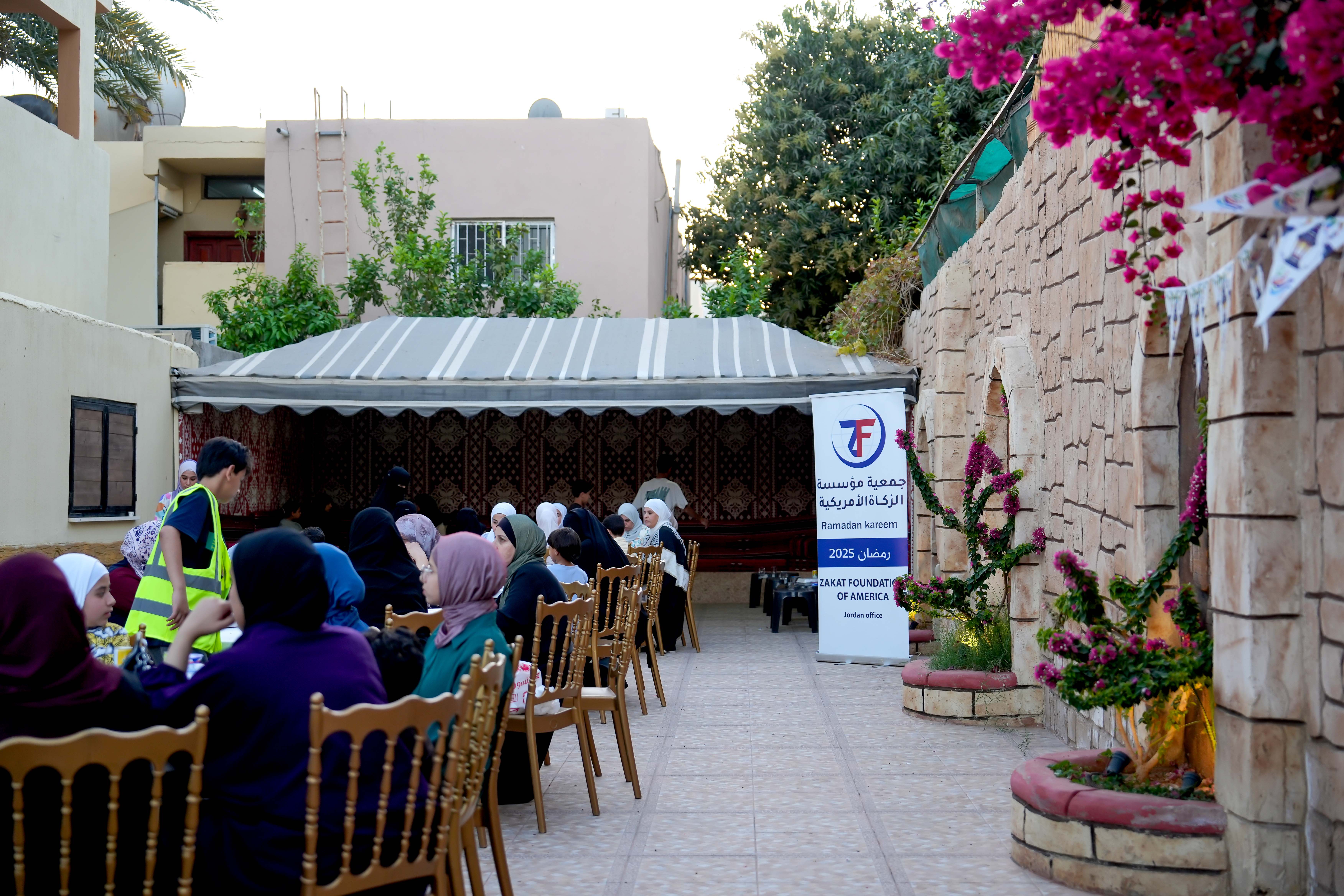 Hot iftar meals are served to families in Jordan