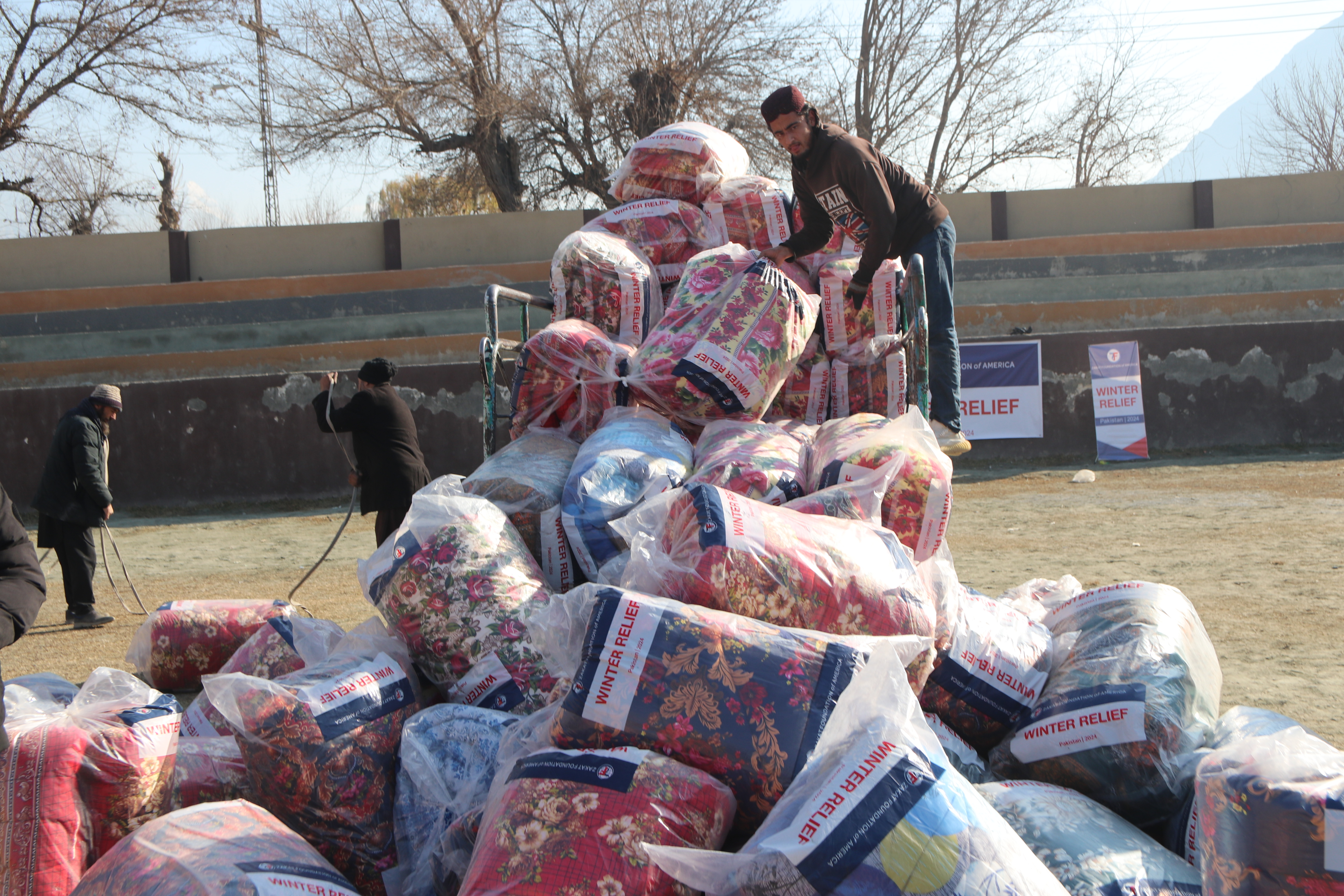 In Pakistan, warm blankets keep families protected from freezing temperatures
