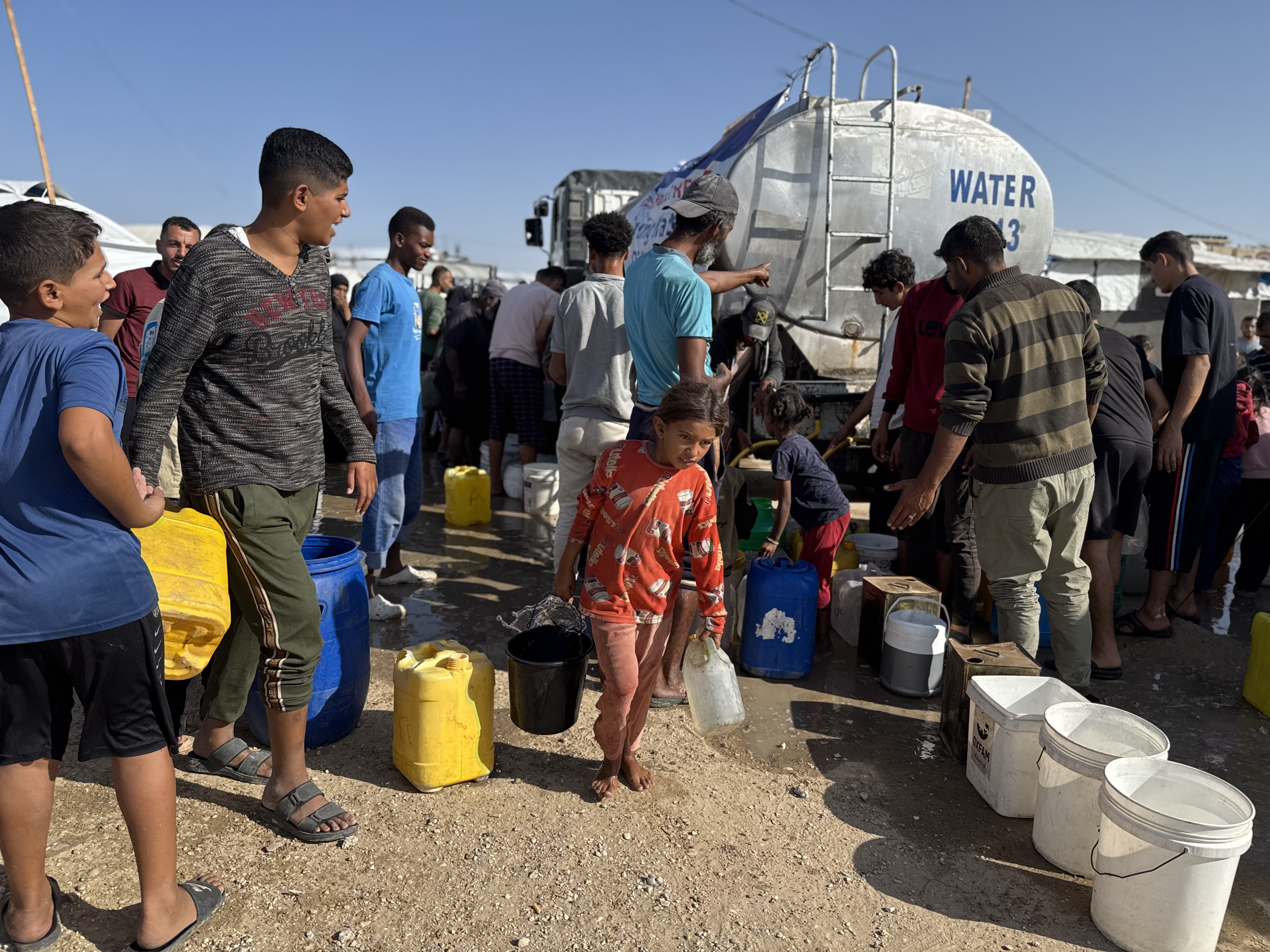 Little hands carry heavy loads in Gaza, but your support brings hope