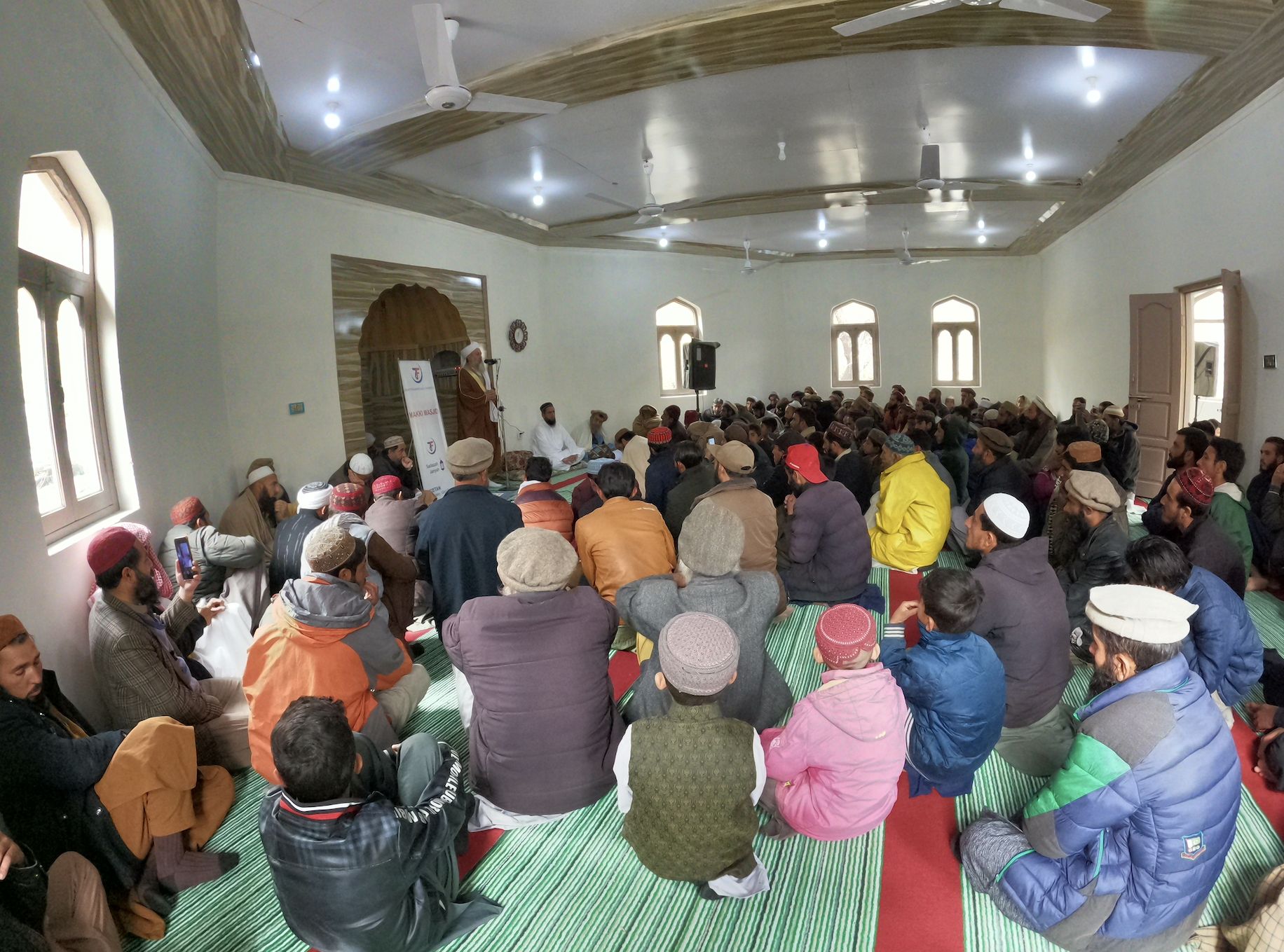 Makki Masjid in Gilgit Baltistan, Pakistan is filled with congregants as they learn from the local Imam