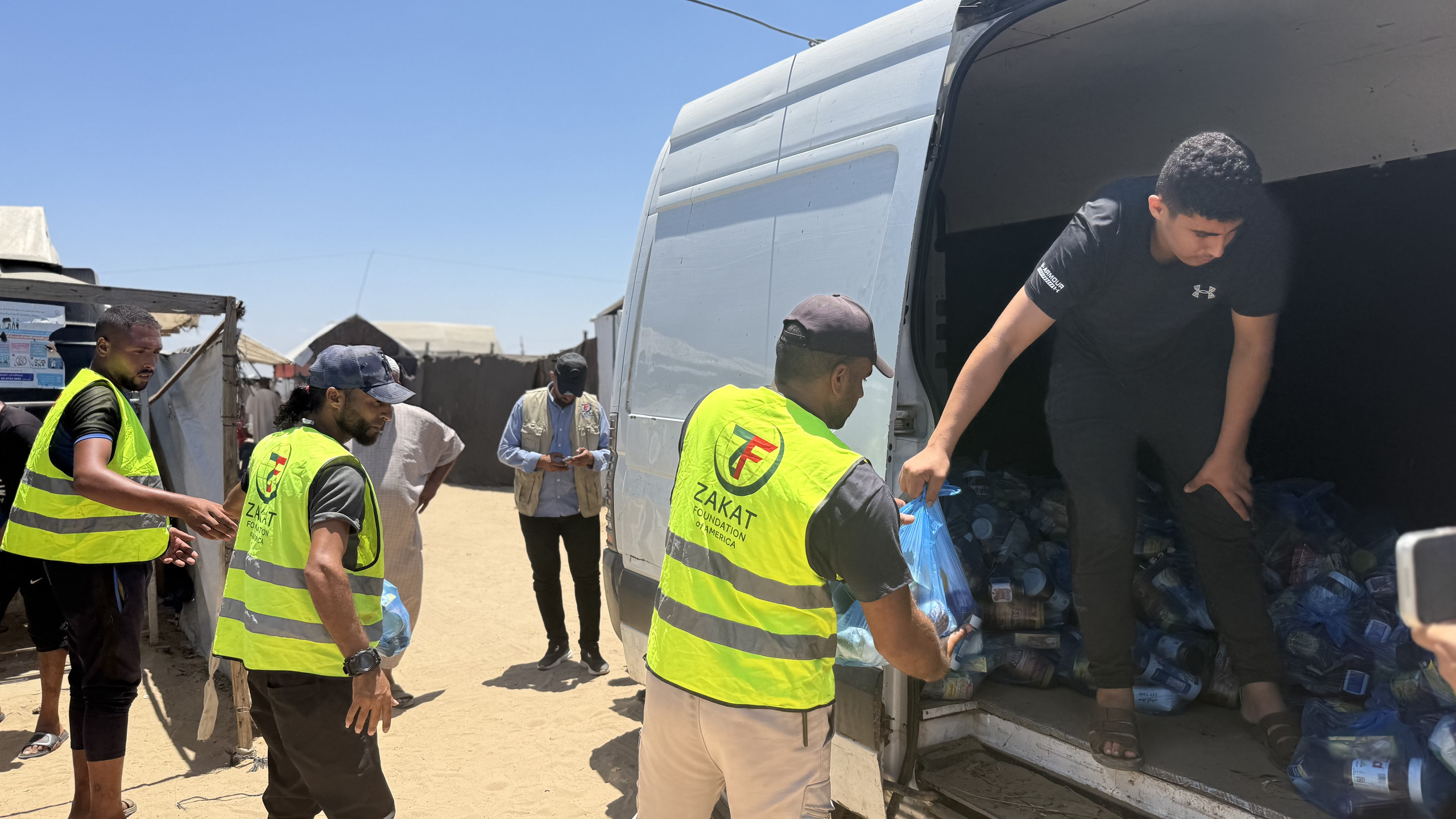 Our teams in Gaza hand out food packages to displaced families