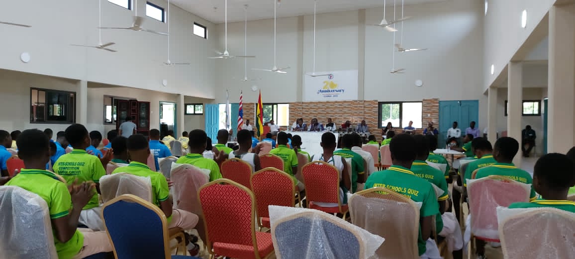 Quiz competition participants at our community center in Ghana listen on as judges make their remarks