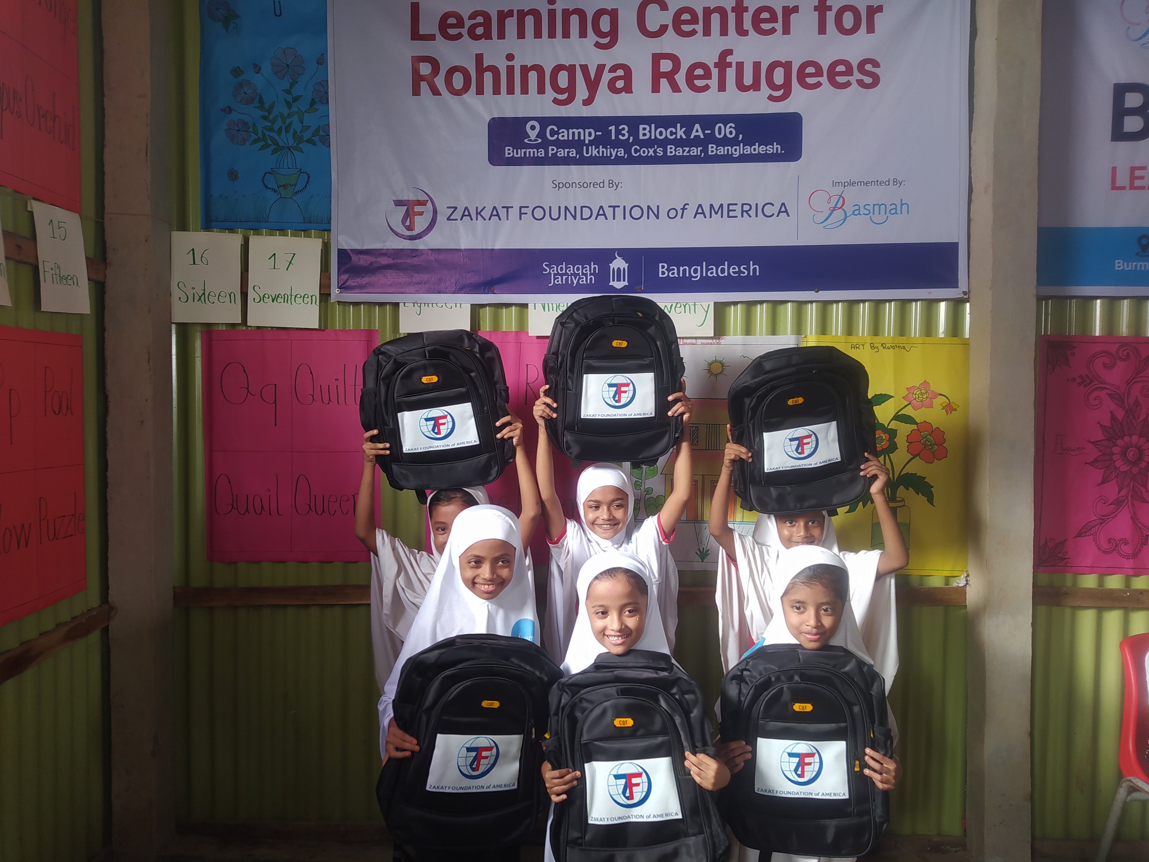 Rohingya students show their excitement at our learning center in Bangladesh