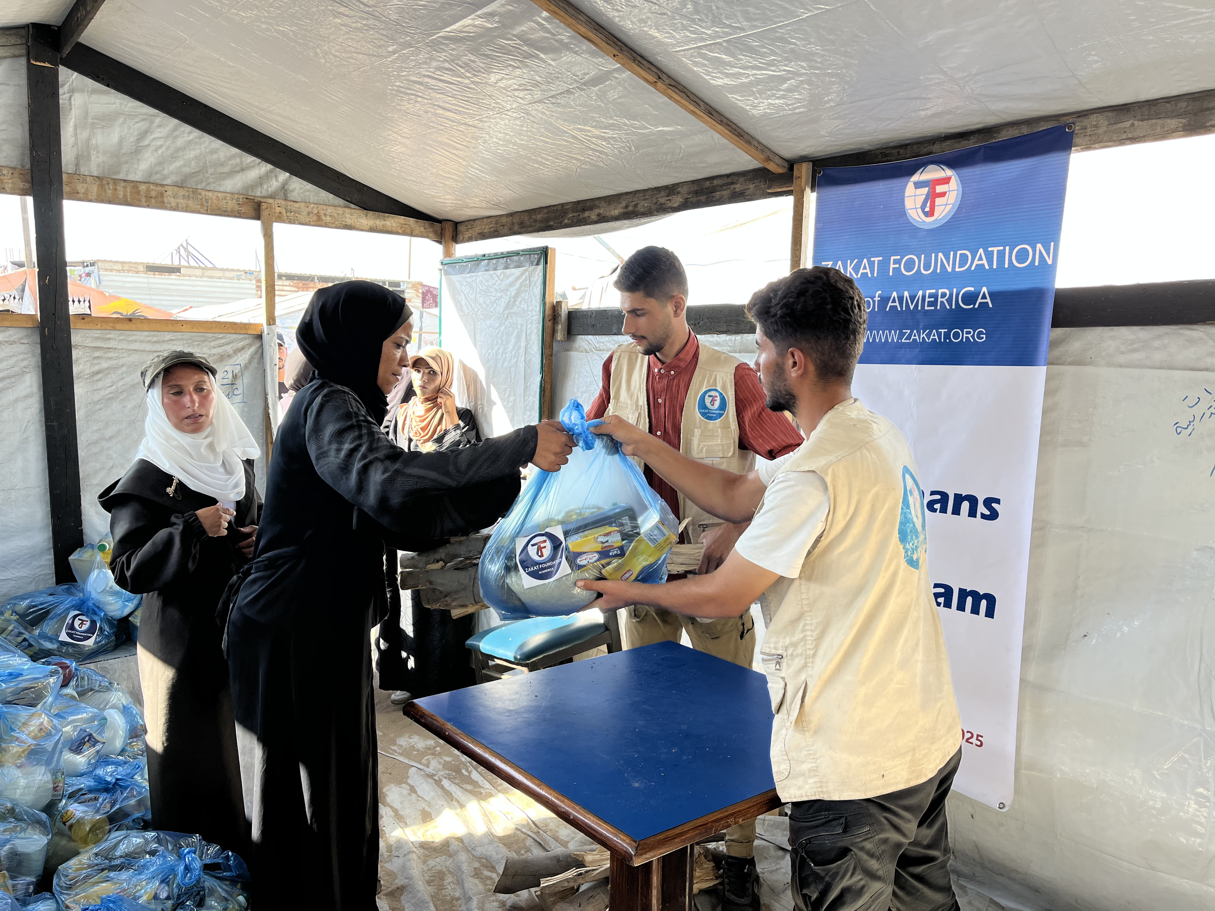 Sponsored orphans receive food packages