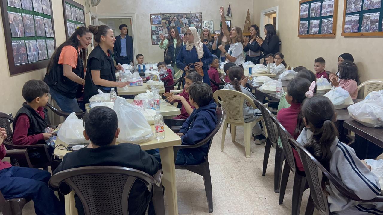 Sponsored orphans and their guardians enjoy hot iftar dinners