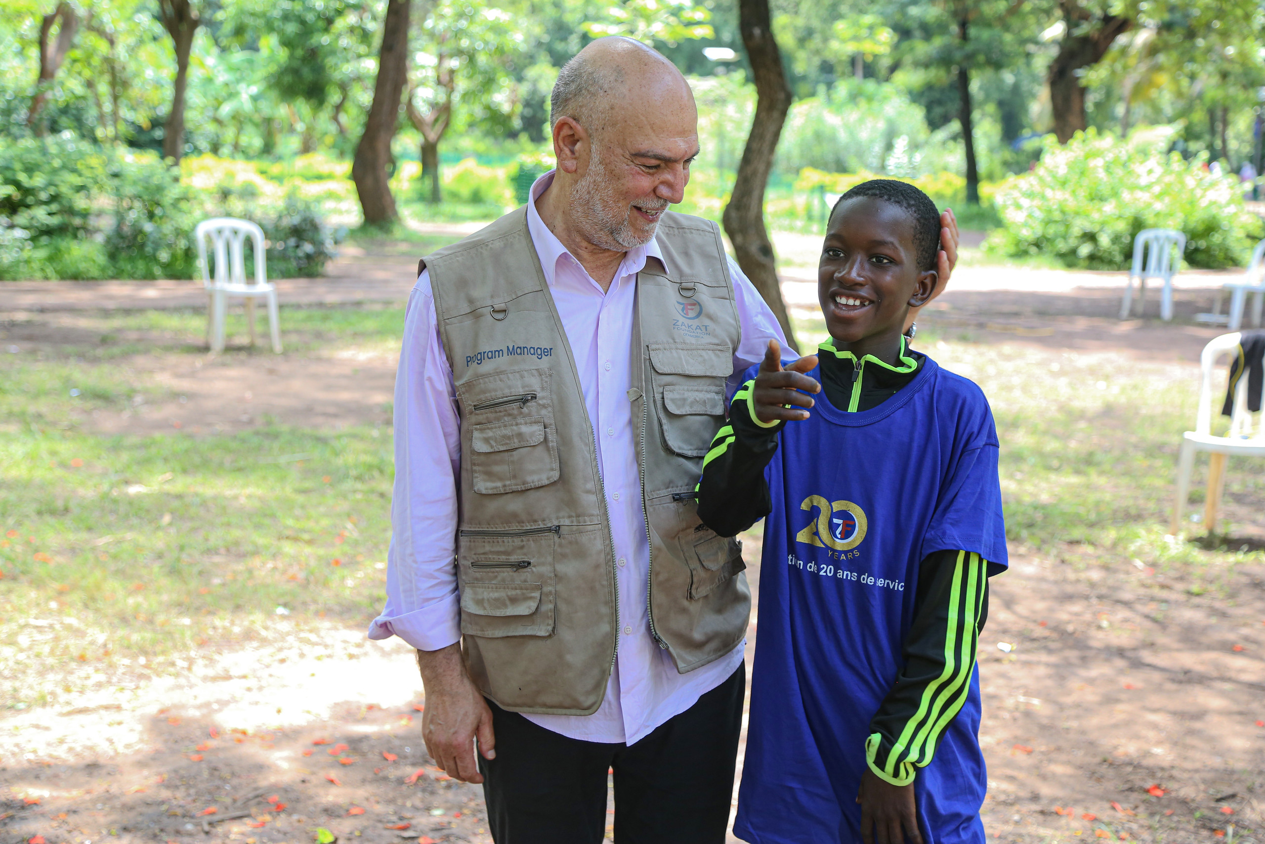 Sponsored orphans in Mali spend time with our Executive Director Mr. Khalil Demir