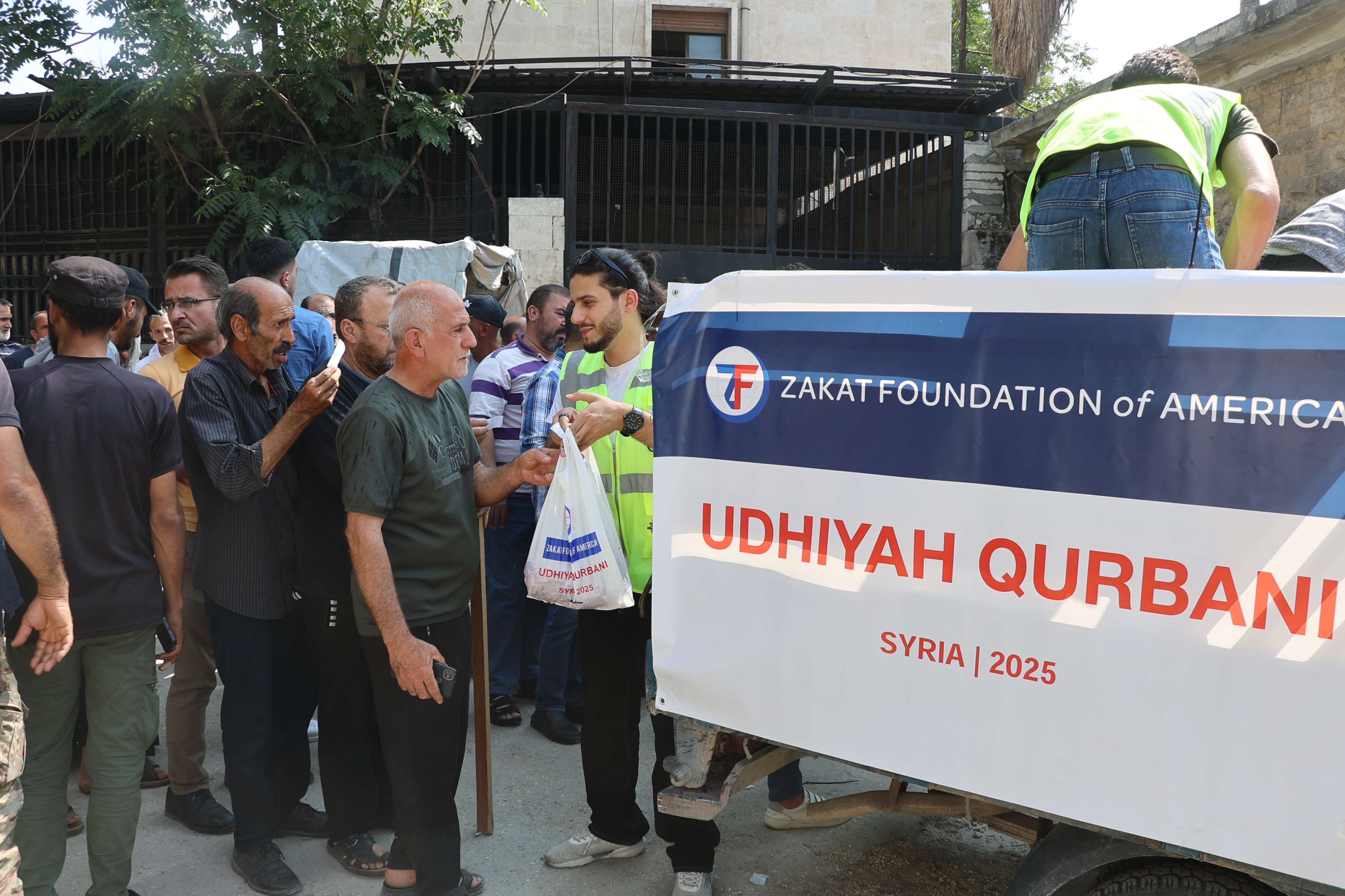 Syrian families line up to receive your generous Udhiyah-Qurbani shares
