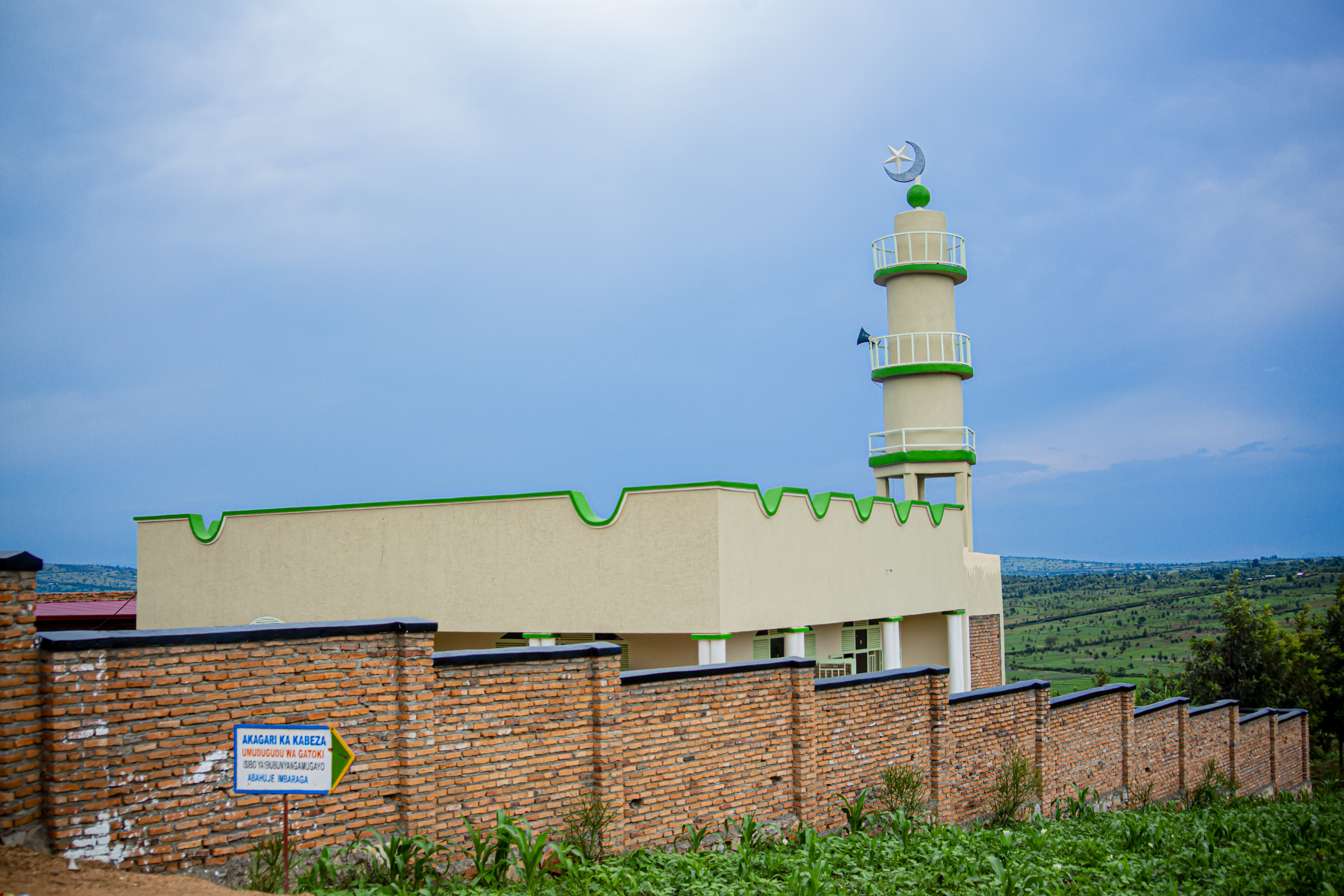 The minaret of Abdallah Gatoki mosque in Rwanda can be seen from afar as congregants gather for prayer