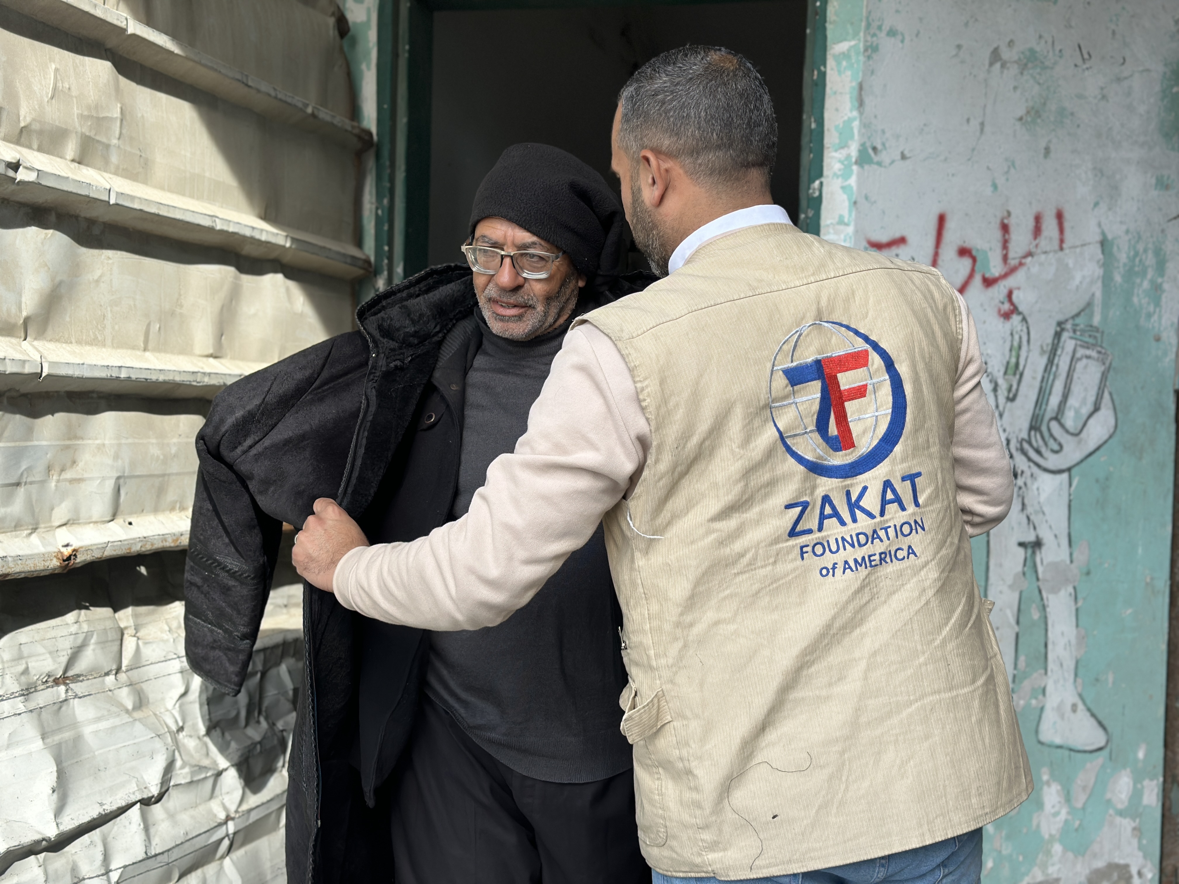 Warm winter coats are an added layer of protection for families in Gaza