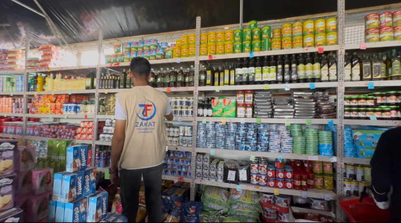 With care and dignity our teams stock shelves to give Gazans respect to secure food essentials as they wish