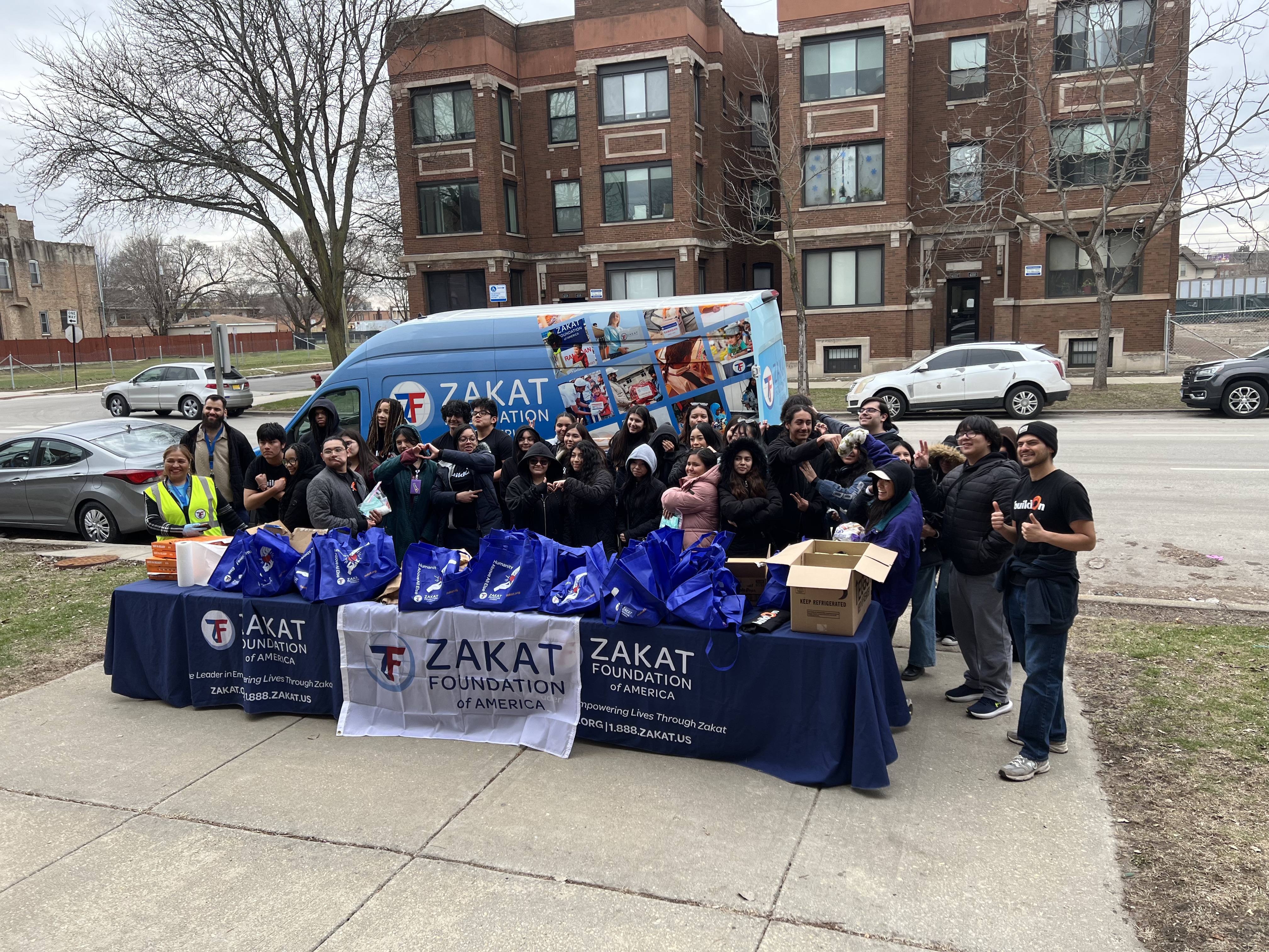 Youth volunteers in Chicago prepare for a day of hygiene kit distributions